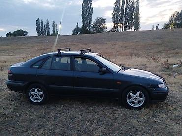 Mazda 626: 2003 г., Седан — 3