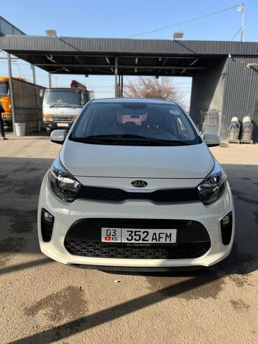 глушитель акропович: Белый хэтчбек Kia Morning, идеально подходящий для городских поездок