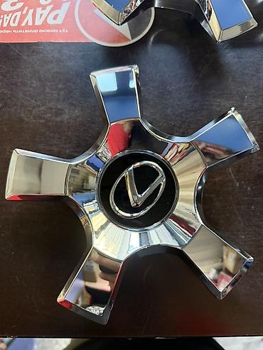 Колпачки центральные на диски Lexus (комплект 4 шт.) - Тип at lalafo.kg Колпачки центральные на диски Lexus (комплект 4 шт.) - Тип