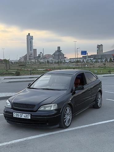Opel: Model: Opel Astra G Coupe (3 qapı) Rəng: qara Kuzov: hetçbek/kupeli 3 — 1