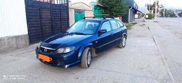 буфер авто: Mazda 323: 1999 г., 1.6 л, Механика, Бензин, Хэтчбэк