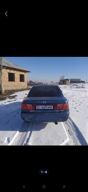 Mazda: Mazda 323: 1998 г., 1.5 л, Механика, Бензин, Седан