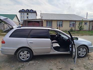 merc w210: Toyota Avensis: 2003 г., Бензин — 4