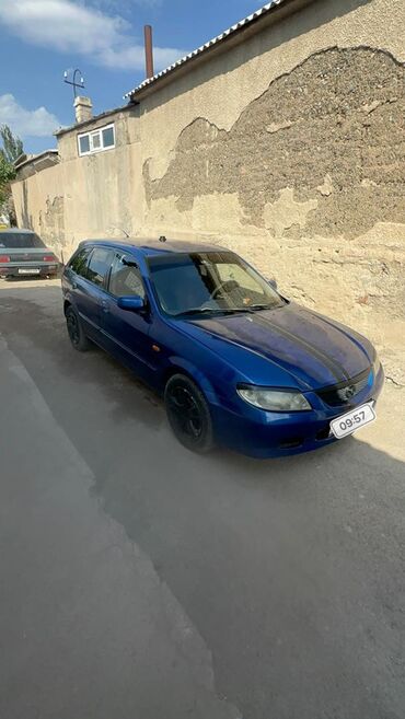 машина бугатти: Mazda 323: 2001 г., 1.6 л, Механика, Бензин