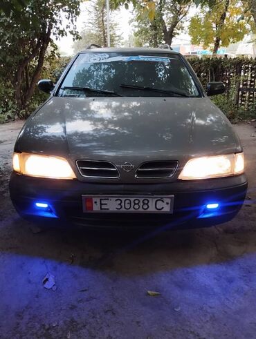 124 аморт: Nissan Primera: 1998 г., 1.6 л, Механика, Бензин, Универсал