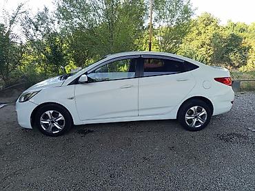 мини электро: Hyundai Solaris: 2012 г., Механика, Седан — 2