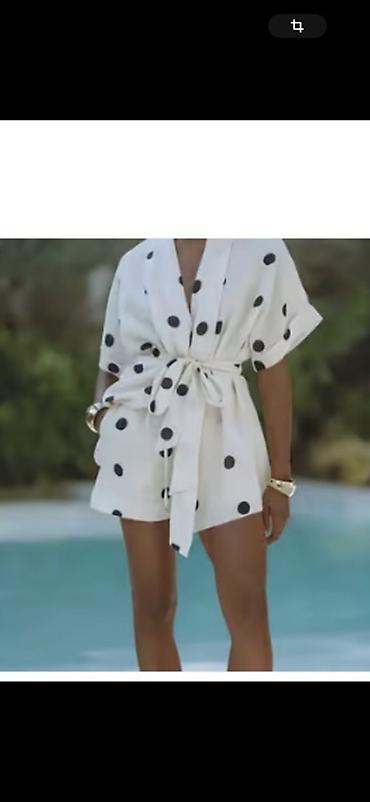 tulum sekilleri: Ağ rəngli, iri qara xallı qadın kombinezon (playsuit): - Model: qısa — 1
