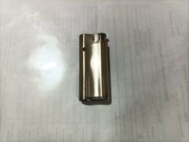 mona torbica m: Zippo lighter, Used