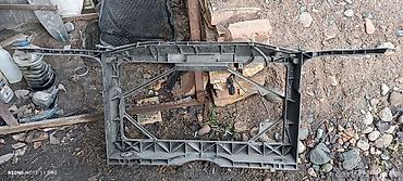 mazda 2000: Решетка радиатора Mazda 2004 г., Б/у, Оригинал — 2