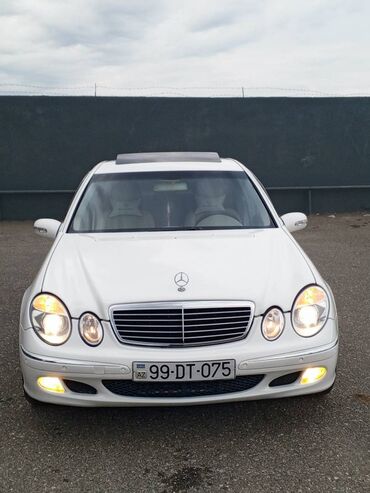 turbo az dörd göz: Mercedes-Benz 260: 2.6 l | 2003 il Sedan