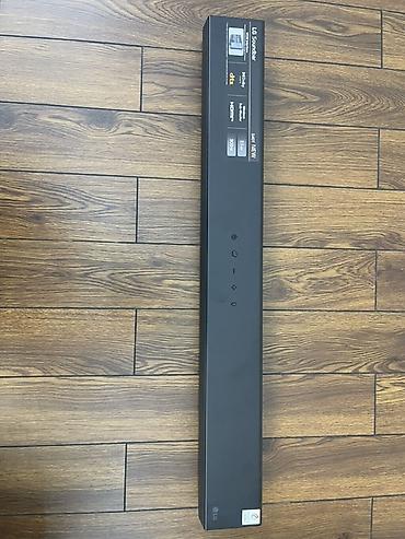 muz sentr: LG Soundbar + simsiz sabvufer dəsti Yeni Xüsusiyyətlər: - 2.1 kanal — 2