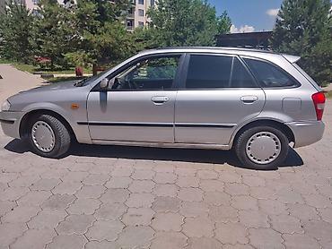 a8 d2: Mazda Familia: 1999 г., 1.6 л, Механика, Бензин, Универсал — 5