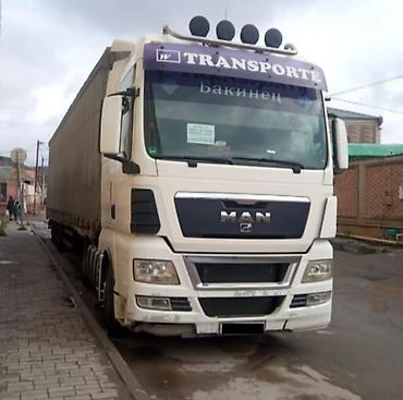 mercedes 208 d: MAN TGX dartqı avtomobili və tentli yarımqoşqu - Markа/model: MAN TGX — 4