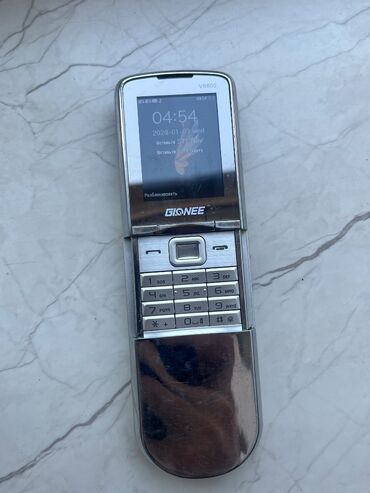 010 ile nomreler: Nokia 800C, цвет - Серебристый