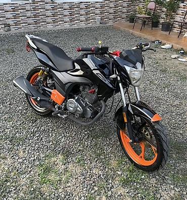 matasklet lənkəran: Motosiklet – küçə/naked tip Xüsusiyyətlər: - Rəng: parlaq qara gövdə — 1