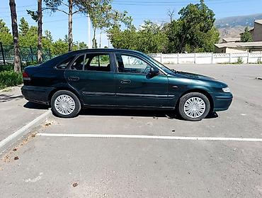 385 55: Mazda 626: 1997 г., 1.8 л, Механика, Бензин, Седан — 4