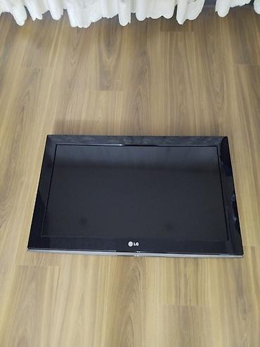 ТВ и видео: LG plazma televizor. Qara rəngli, geniş ekranlı modeldir. Ön hissədə — 3