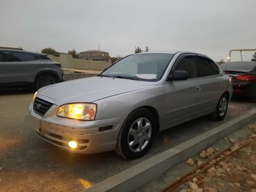 Hyundai: Hyundai Elantra: 1.6 l | 2004 il Sedan — 21