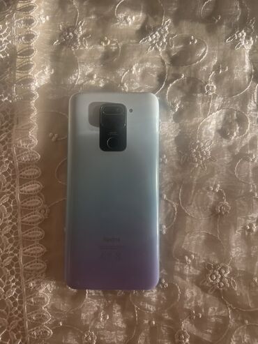 telofon redmi: PLATASI YANIB EKRAN ACILMIR Arxa tərəfində kamera modulu və Redmi