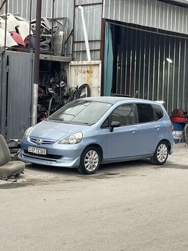 шины каракол: Honda Fit (GD) — компактный 5‑дверный хэтчбек голубого цвета