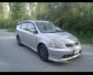 гидравлический домкраты: Honda Stream: 2001 г., 2 л, Автомат, Бензин, Вэн/Минивэн