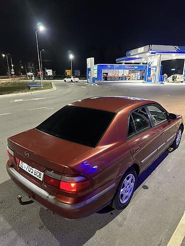 глушитель ауди: Mazda 626: 1998 г., 1.8 л, Механика, Бензин, Седан — 7