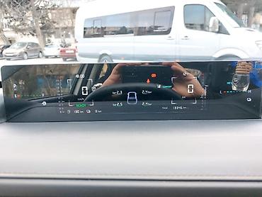 Chery: Model: Omoda A05 (sedan) Rəng: ağ Yanacaq sistemi: hibrid (benzin + — 9