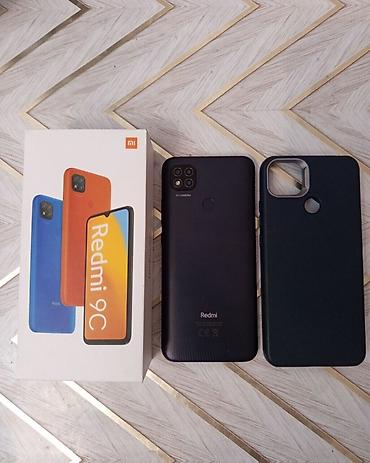 redmi note 9 lite: Redmi 9C, 128 GB, rəng - Qara, Zəmanət, Barmaq izi, Simsiz şarj — 2