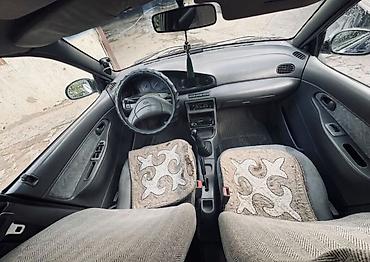 kia sephia: Kia Avella: 1997 г. — 4