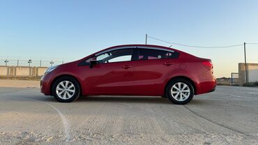 Kia: Kia Pride: 1.4 l | 2013 il Sedan — 12