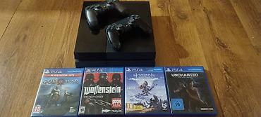 2 hand mobile: PlayStation 4 konzola (crna), sa dva bežična DualShock 4 kontrolera i — 1