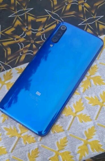 телефон fly fs458 stratus 7: Xiaomi Mi 9, 64 ГБ, цвет - Синий