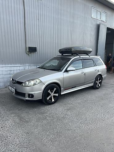 200: Nissan Wingroad: 2003 г., 1.5 л, Автомат, Газ, Универсал — 7