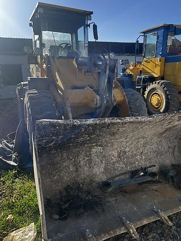 Погрузчики: Погрузчик, 2010 г., Колесный, Фронтальный — 9