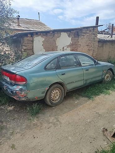 фикс токмок: Mazda 626: 1993 г., 1.8 л, Механика, Бензин — 1