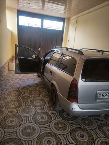 Opel: Opel Astra: 2 l | 1999 il 250 km Universal — 10