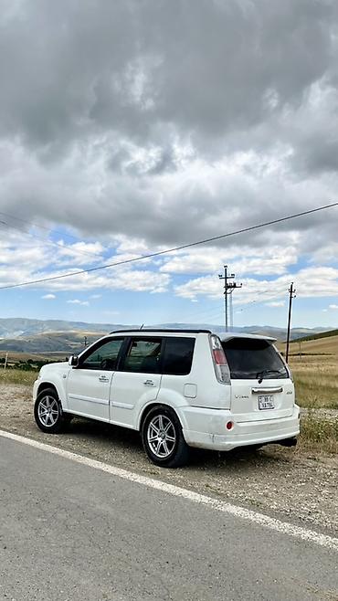 opel astra 1994: Nissan X-Trail: 2 l | 2004 il Krossover — 3