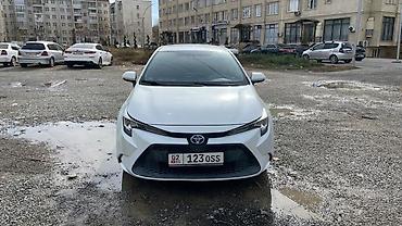 Toyota Corolla: 2020 г., 1.8 л, Вариатор, Гибрид, Седан