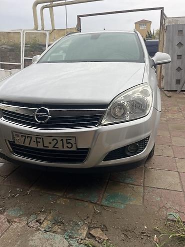 lada kalina 2008: Opel Astra Caravan (universall) – gümüşü rəng Xüsusiyyətlər: - Kuzov — 5