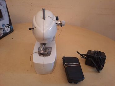 Mini prenosive šivaće mašine: Mala/putna sivaca masina,prenosiva masina za sivenje
Isravna — 14