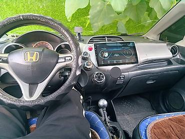 xpeng g3: Honda Fit: 2009 г., 1.5 л, Механика, Бензин, Хэтчбэк — 2