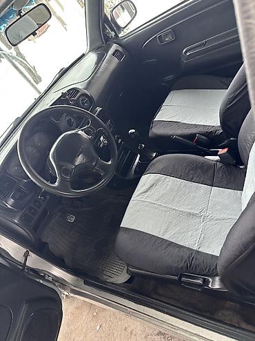 Daihatsu: Daihatsu Cuore: 2002 г., 1 л, Механика, Бензин — 18