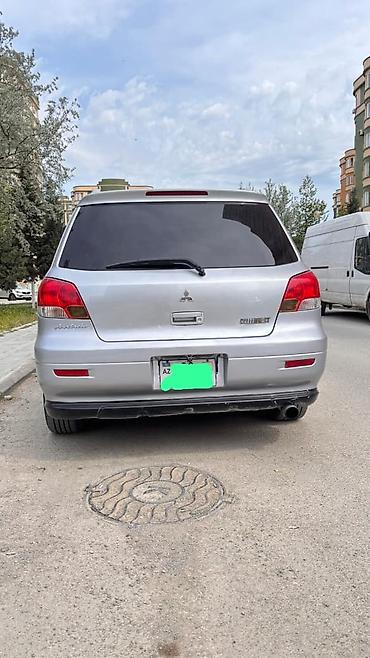 mitsubishi lancer evolution: Mitsubishi airtrek 2003 2 sadə mator ön çəkən Təkərlər təzə di — 1