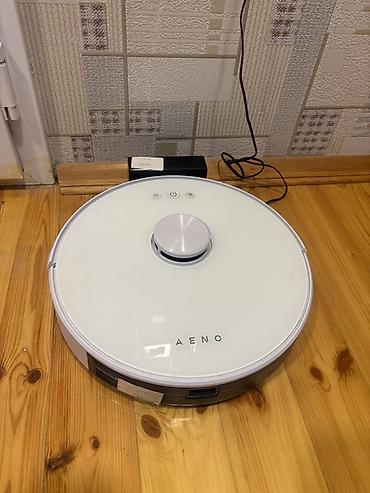 eurolux tozsoran: AENO robot tozsoran - Dairəvi, ağ gövdə, üst paneldə fiziki idarə — 1