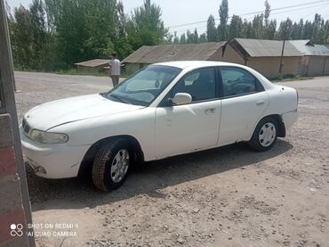 кожа для руля: Daewoo Nubira: 1997 г., 1.6 л, Механика, Бензин, Седан