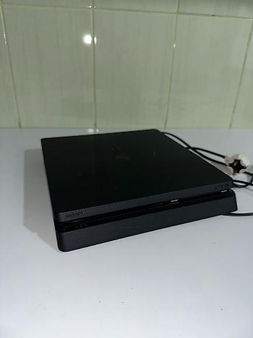 ретро приставка: Игровая приставка Sony PlayStation 4 Slim (черная) Комплектация: - — 2
