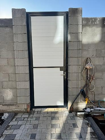 Секционные ворота: Секционные ворота и калитки из сендвич-панелей - Секционные подъемные — 3