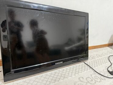 плоский телевизор купить: Телевизор Samsung с плоским экраном черного цвета. Без пульта