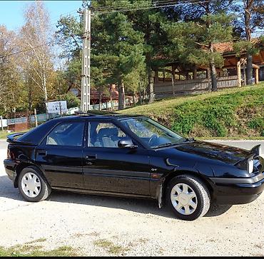 mb 220: Mazda 323: 1992 г., Механика, Бензин, Хэтчбэк — 1