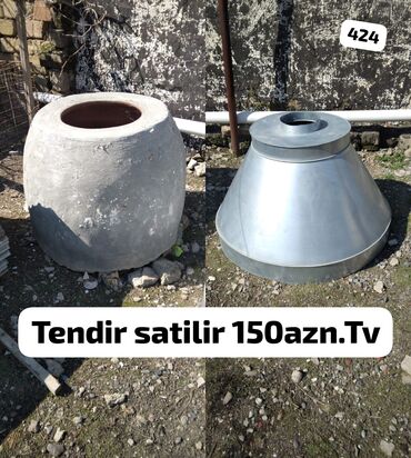 Popkorn aparatları: Yemək bişirmək üçün uyğun olan təndir sobası. Bu təndir silindrik